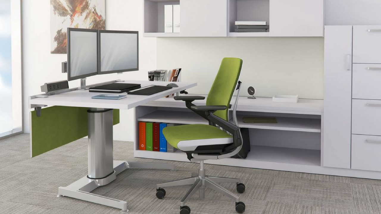 Research found that sit-stand desks are linked to increased productivity, better mental concentration, and improved overall health. Pictured above: Steelcase Airtouch