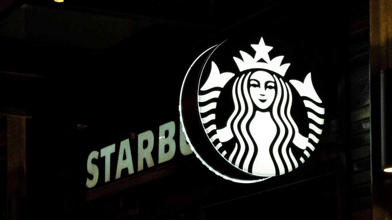 Starbucks suspends stock buybacks
