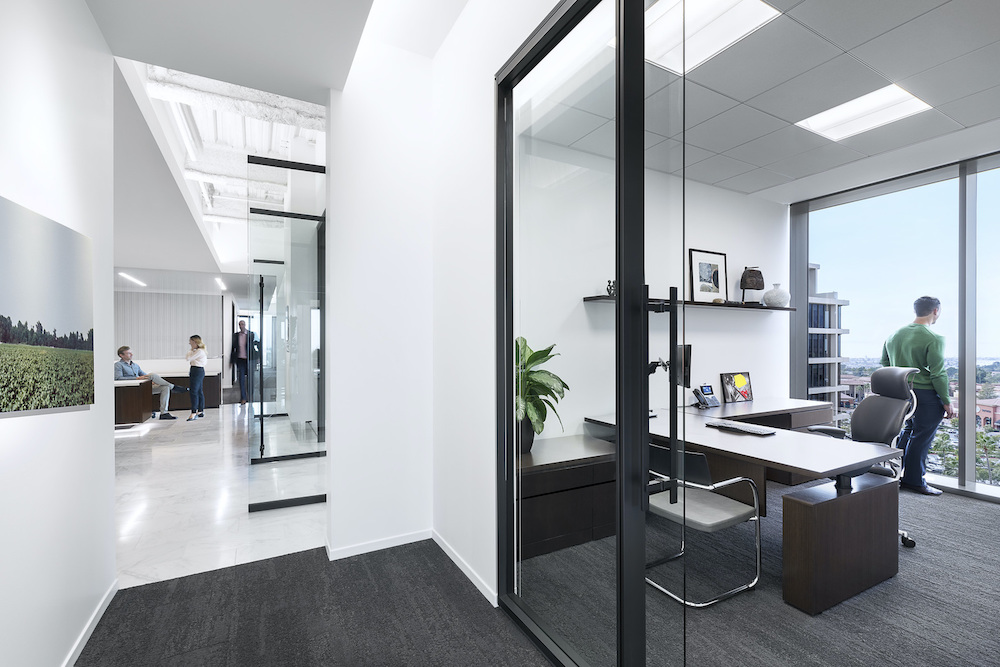 After decades out of style, private offices are reemerging as an incentive for leadership to return to the physical workplace. Credit: Costea Photography, Inc.