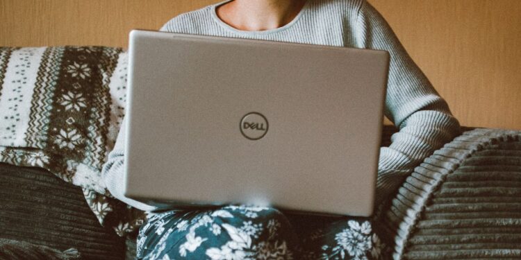 Dell and Flight Centre Push for Full-Time Office Return Amid Worker Resistance