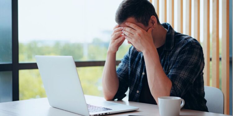 July Layoffs Surge 140%, Fueled by AI Disruption and Government Cuts