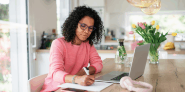 Women Working Remotely Face A ‘Hidden Penalty’ As Promotion Gap Widens