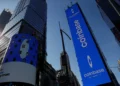 Coinbase To Cut 14% Of Staff In AI-Driven Productivity Push Amid Crypto Volatility
