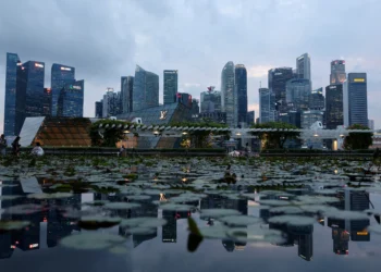Singapore Tells Financial Firms AI Adoption Must Create Jobs, Not Just Savings