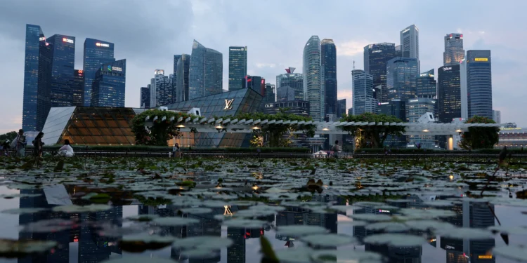 Singapore Tells Financial Firms AI Adoption Must Create Jobs, Not Just Savings