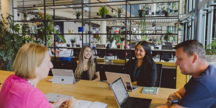 The center has a community kitchen, lounge areas, free parking, 24/7 access, privacy pods, complimentary tea and coffee, an on-site café, and full printer access.