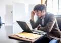 The Exhaustion Tax Is Paralyzing Workers — And The Businesses They’re Stuck In