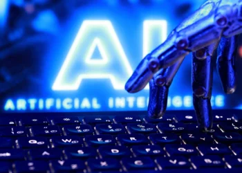 "AI Artificial Intelligence" words, a keyboard and a robotics hand in this illustration taken, September 23, 2026. REUTERS/Dado Ruvic/Illustration/File Photo
