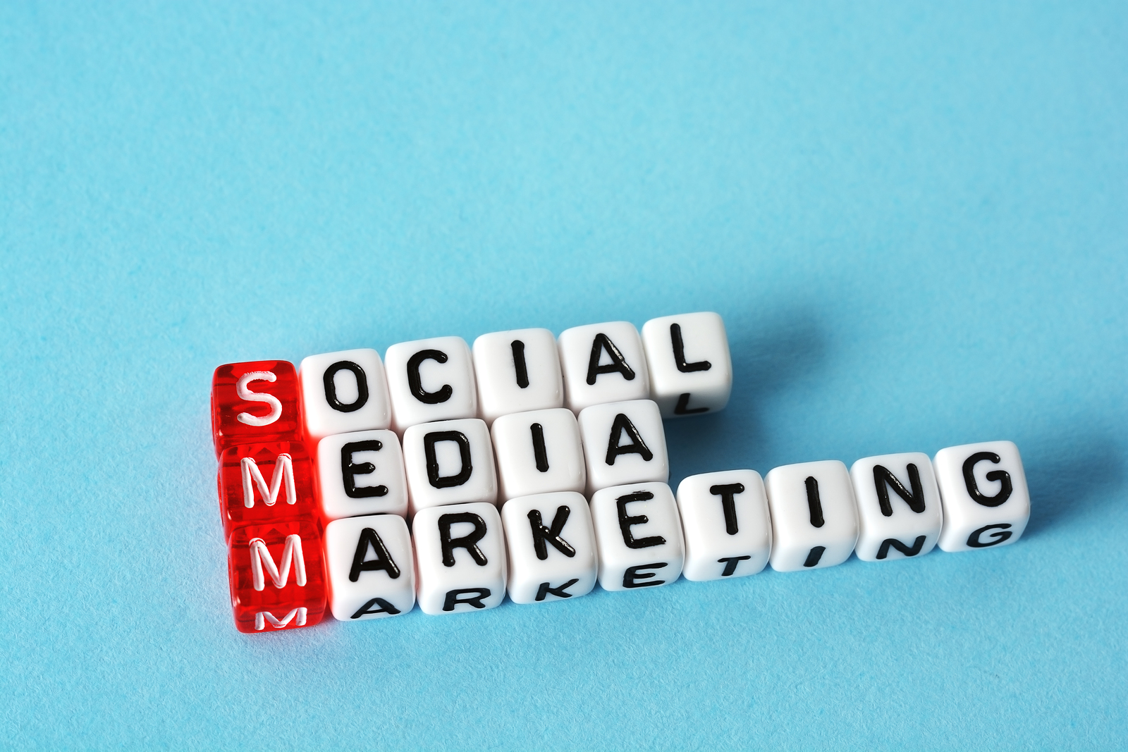 SMM Social Media Marketing definition acronym on blue